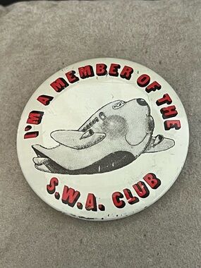 Novelty Round Pin Button - White with Red Text - S.W.A. Club